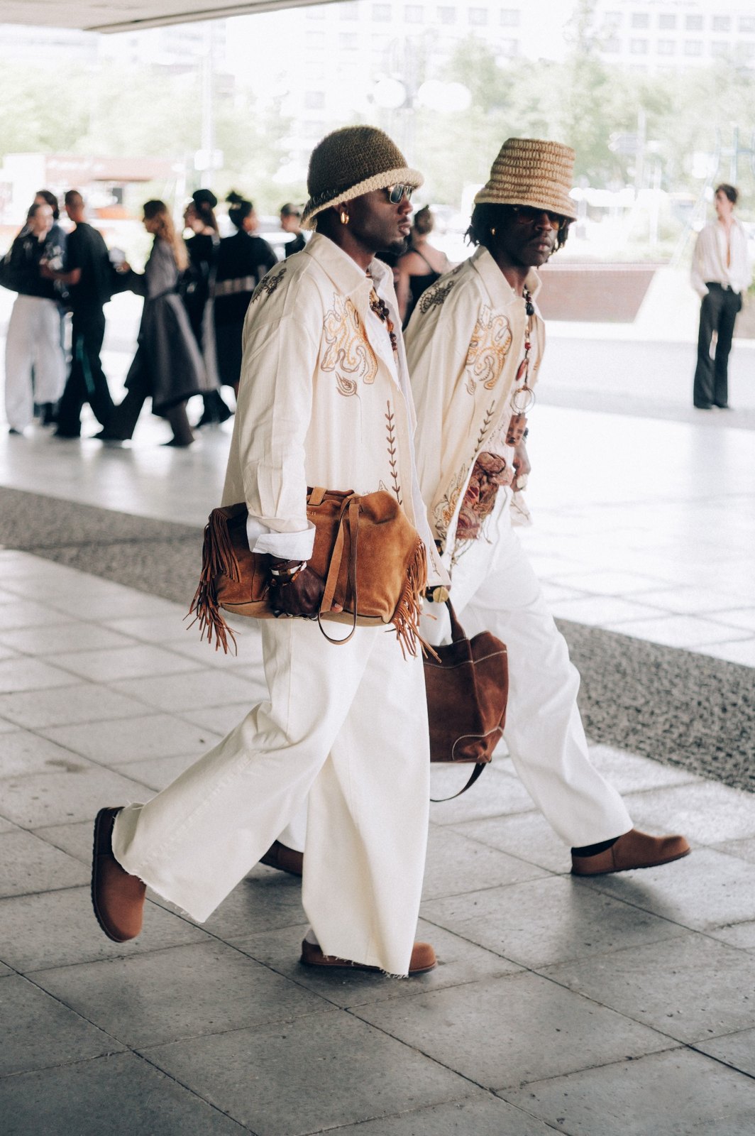 Two Fashion Week talents walking together