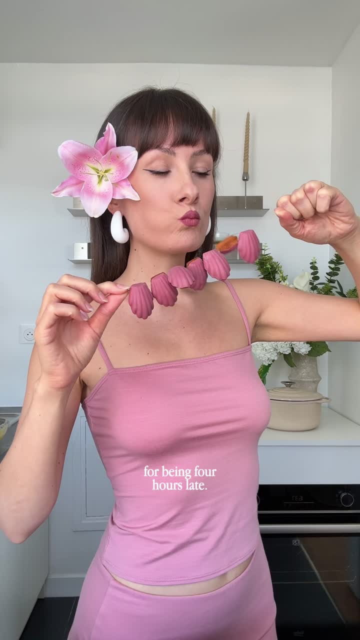 Creator making a pink necklace