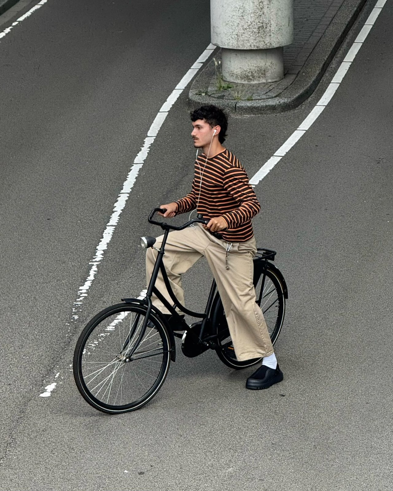 Creator photographed with a bicycle