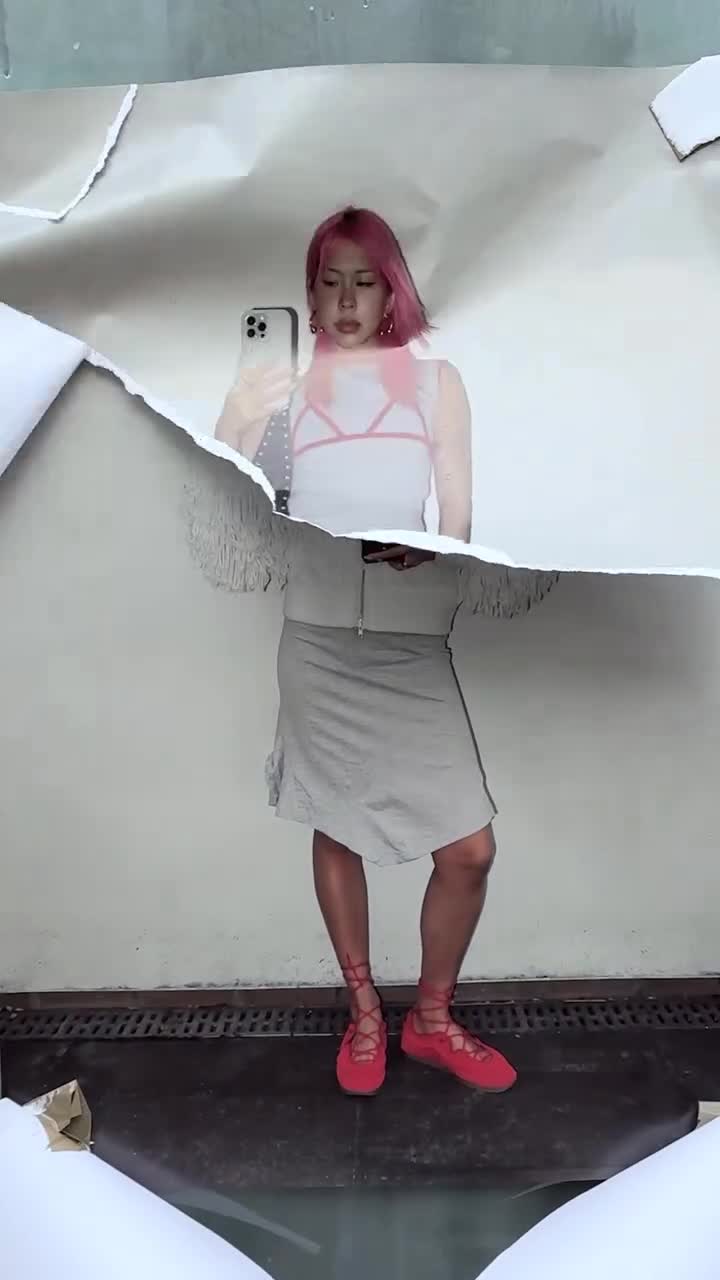 Creator featured in a playful mirror video