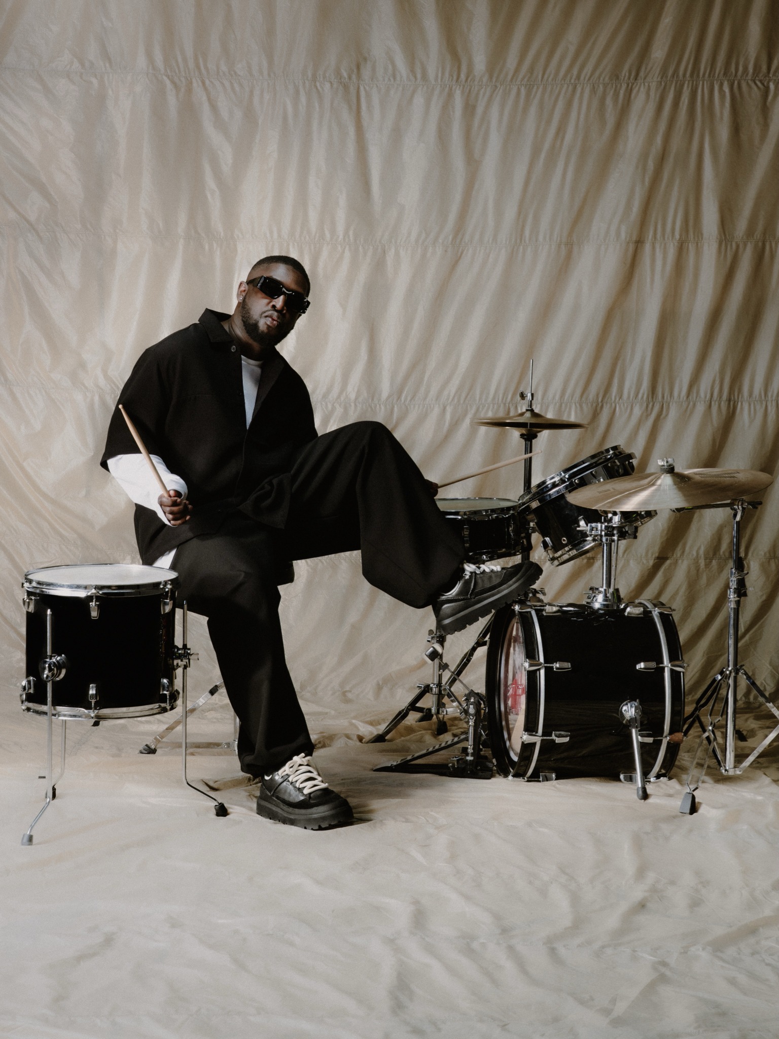 UGG styling portrait with drums
